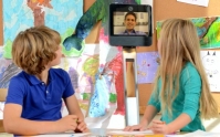 Beam+ telepresence device with two children