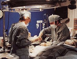 Surgeons preparing a patient for cryopreservation
