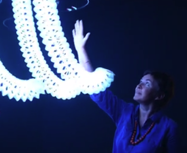 Woman interacting with display