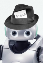 Robot wearing a press hat